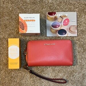 Michael Kors Vibrant Coral Wristlet Beauty Bundle